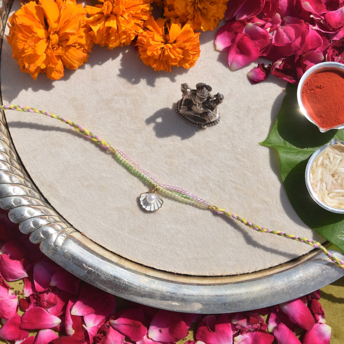 Pink, Green & Golden Quartz with Signity Pearls Charm Rakhi for Brother