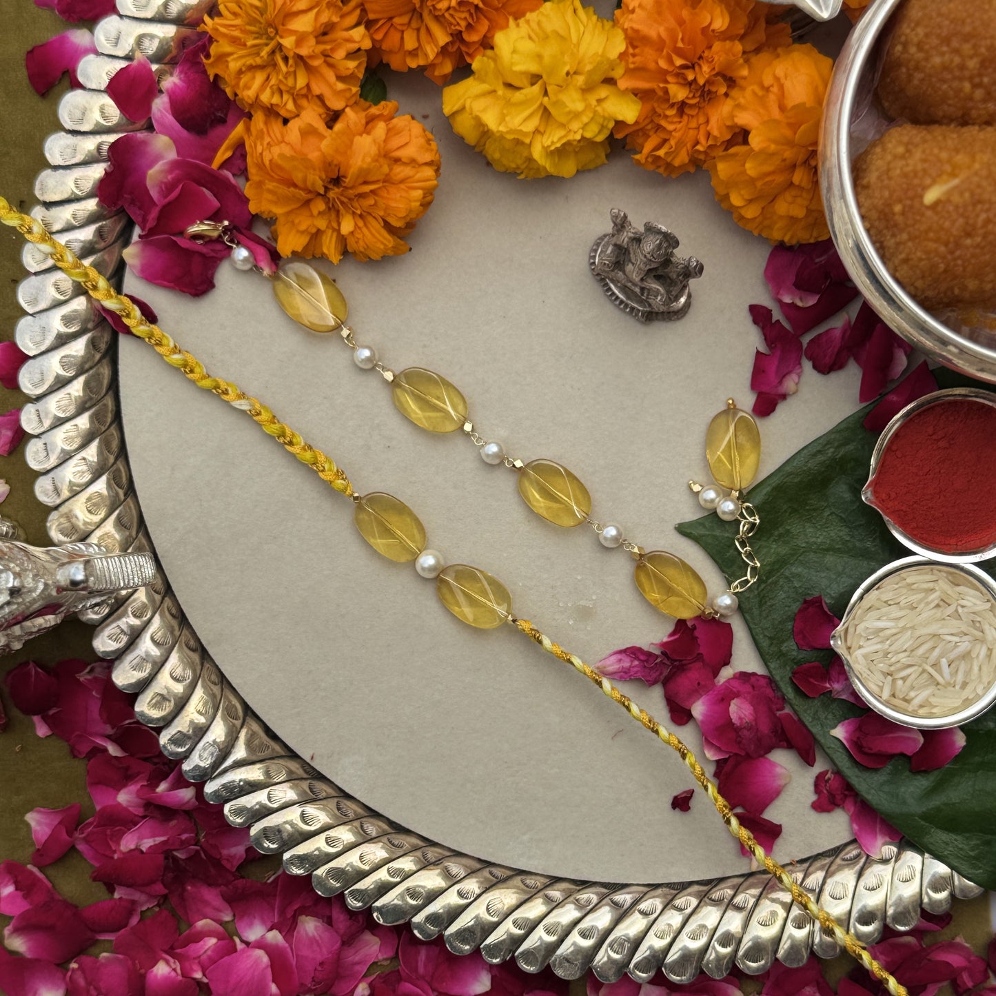 Signity Pearl & Yellow Quartz Rakhi Pair